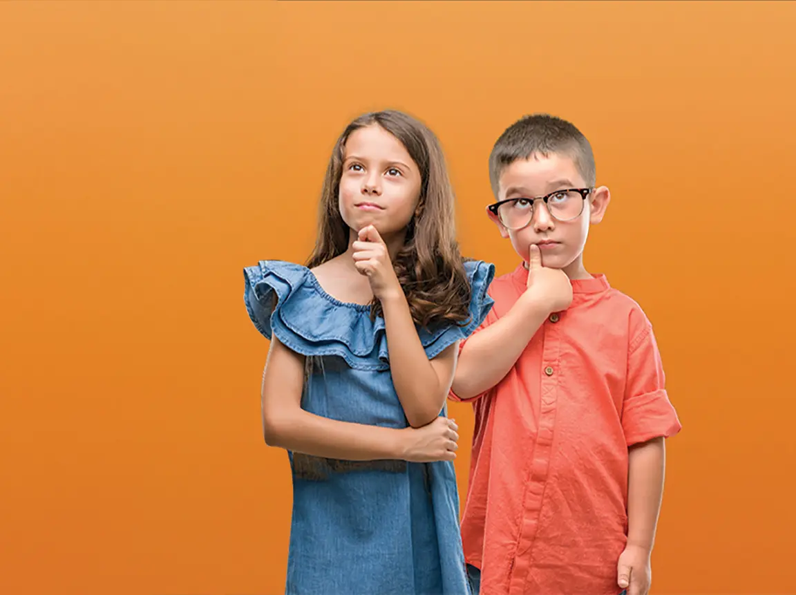 Two children looking puzzled